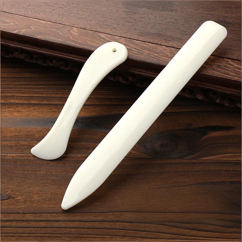 أداة طي الجلد (بون فولدر) قطعت - مراجعة Bone Folder Tool وسعره